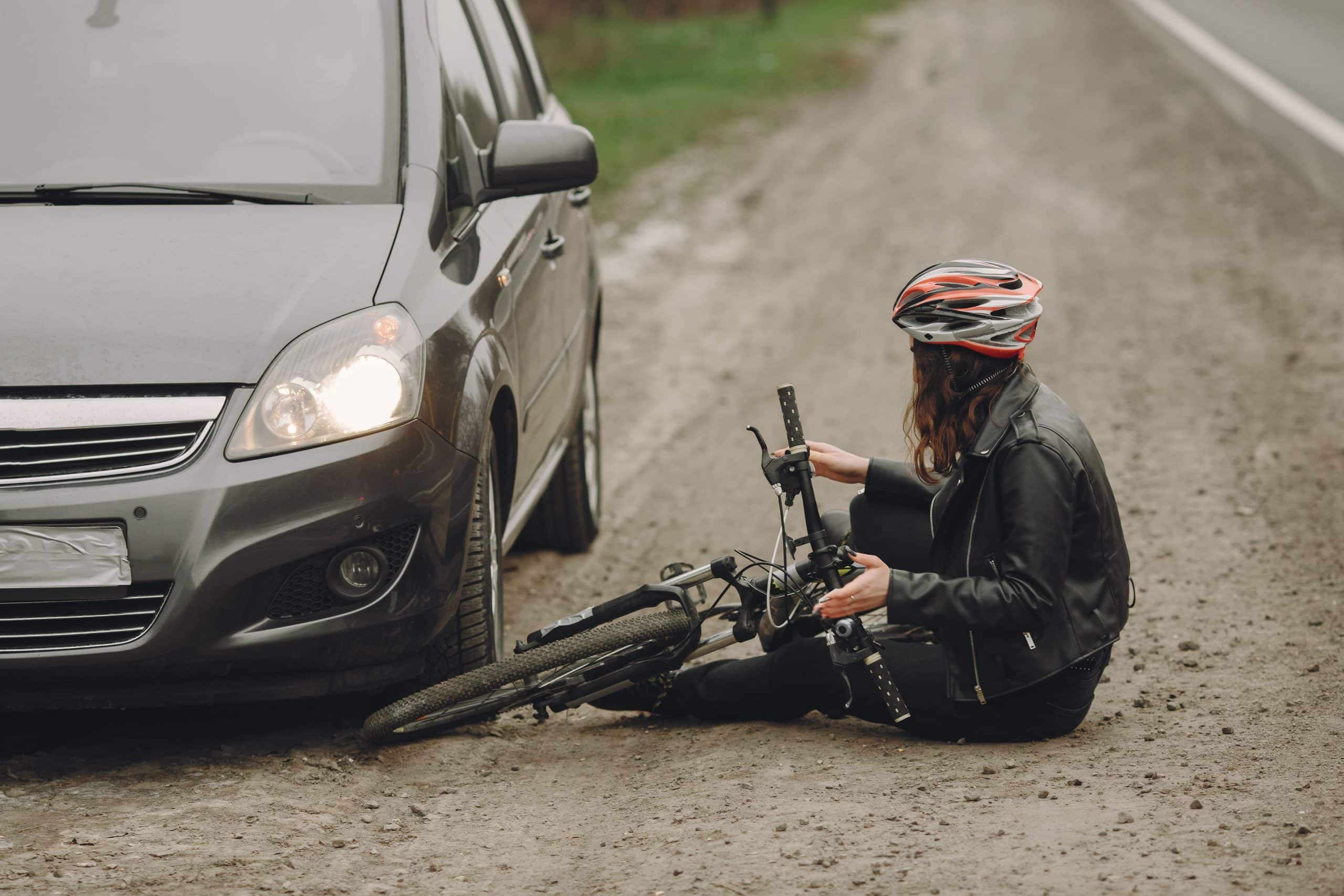 woman-crashed-into-car-girl-helmet-bicycle